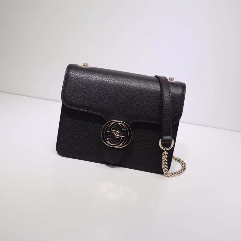 G*u*i clutch bags